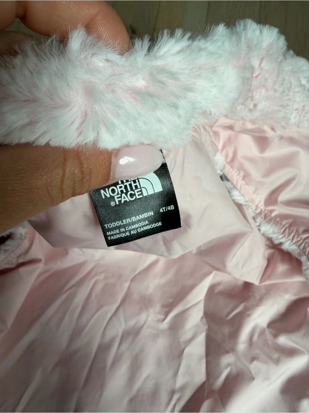 The North face faux fur pink zipper vest size 4